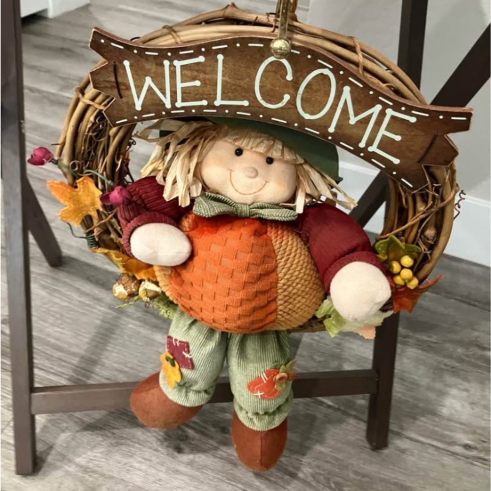 Autumn Scarecrow Welcome Wreath fall-themed wreath, specifically a scarecrow